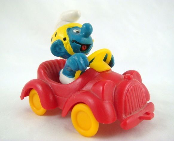 Vintage Peyo Smurf PVC Figurine 40210 Super Smurf Red Car 1979  