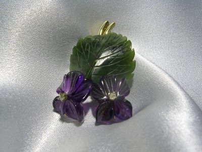   hand made unique carved gemstone brooch in excellent condition