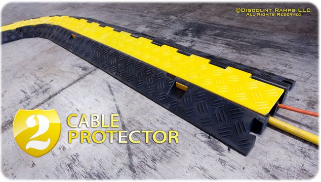 Dual Channel Cable Protector on a warehouse floor