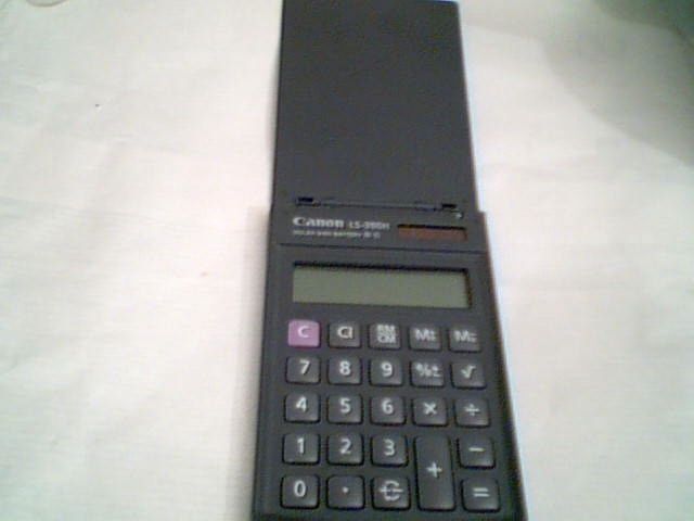   390H SOLAR AND BATTERY CALCULATOR W/FLIP COVER~USE 038569105928  