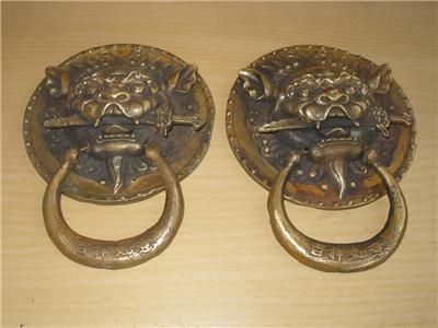 chinese round foo dogs head & sword door knockers  