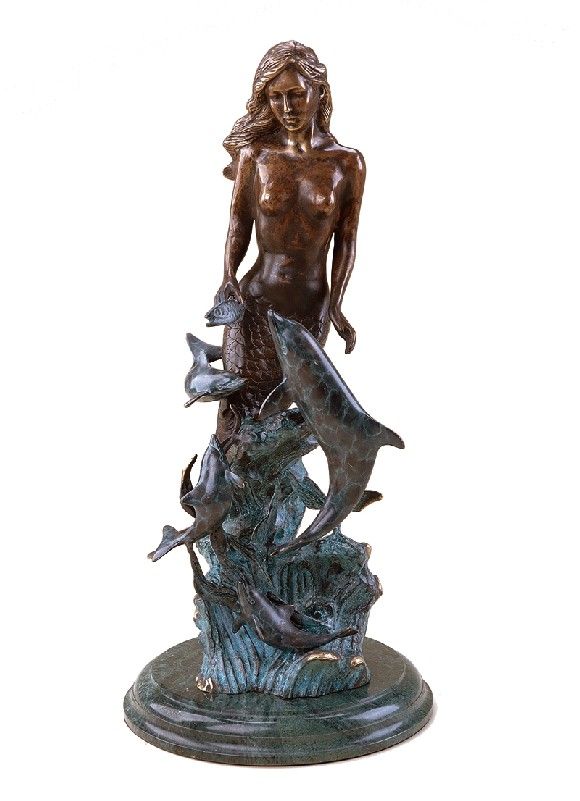 this beautiful mermaid sculpture has been given a deep verdi green 