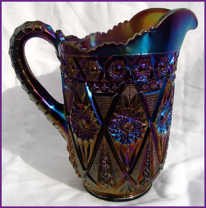 up for auction today is an antique carnival glass water pitcher made 